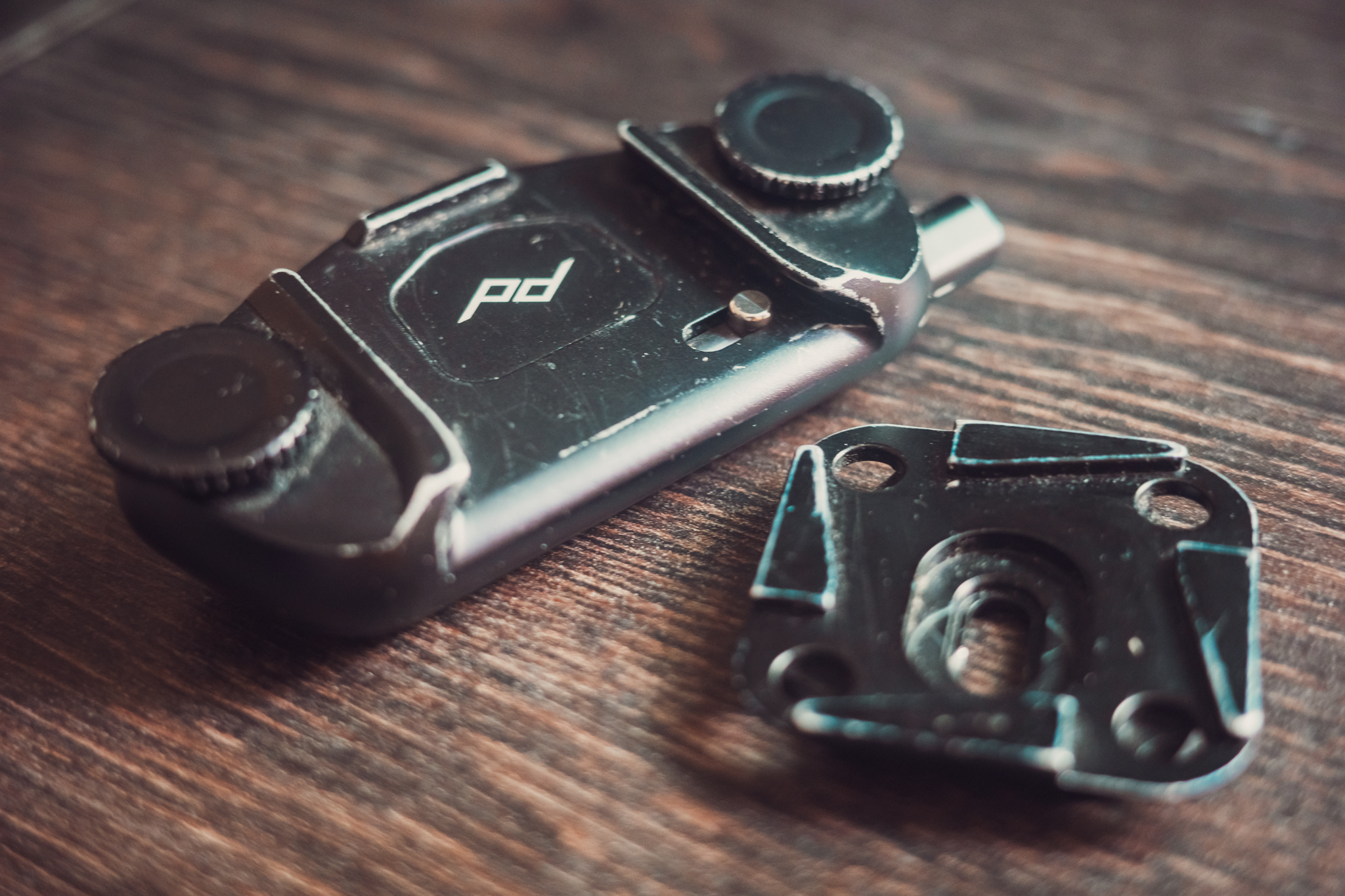 Scratched camera holder for backpack